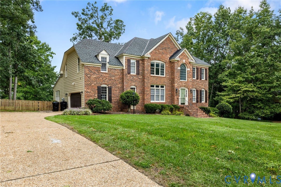 Front of House with Garage View