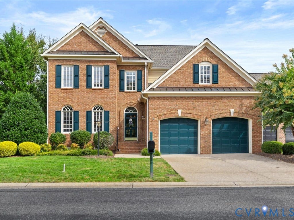 12126 Club Commons Drive, Club Commons, Glen Allen, VA 23059 Brick exterior with an arched entryway, gabled rooflines, and a two-car garage