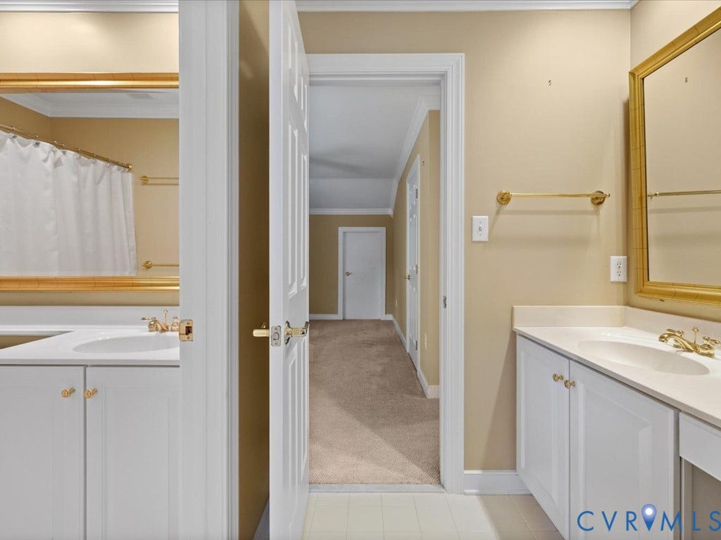 12126 Club Commons Drive, Club Commons, Glen Allen, VA 23059 Dual vanities with integrated sinks, white cabinetry, and gold-toned hardware