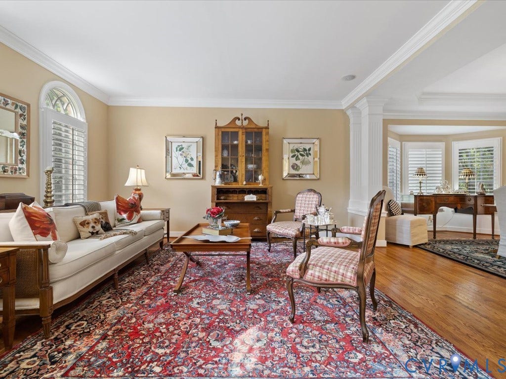 12126 Club Commons Drive, Club Commons, Glen Allen, VA 23059 Hardwood flooring, arched window, crown molding, built-in display cabinet, and plantation shutters