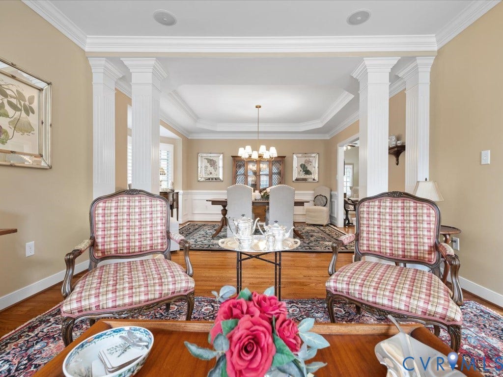 12126 Club Commons Drive, Club Commons, Glen Allen, VA 23059 Hardwood flooring, decorative columns, extensive crown molding, chair rail molding, and a tray ceiling