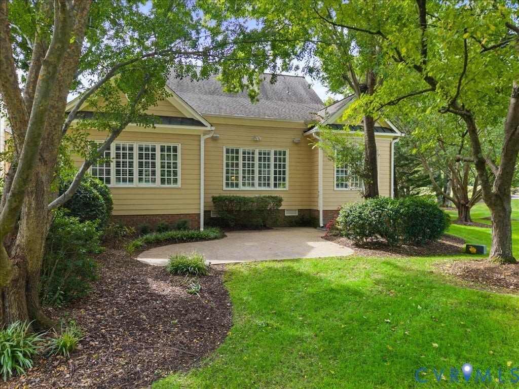 12126 Club Commons Drive, Club Commons, Glen Allen, VA 23059 Rear exterior with beige siding, multiple pane windows, and a concrete patio