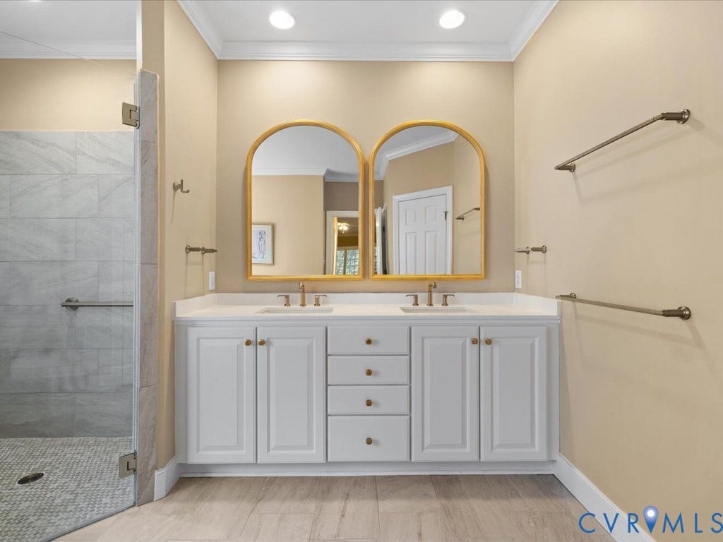 12126 Club Commons Drive, Club Commons, Glen Allen, VA 23059 Dual sink vanity with white cabinetry and gold-toned hardware