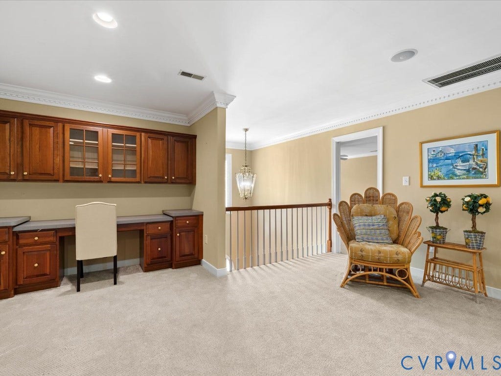 12126 Club Commons Drive, Club Commons, Glen Allen, VA 23059 Built-in cabinetry with glass-front uppers, integrated desk space, and crown molding accents