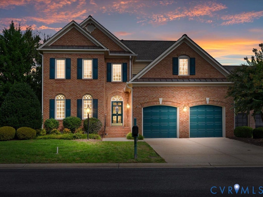 12126 Club Commons Drive, Club Commons, Glen Allen, VA 23059 Brick exterior with dark shutters, dual garage doors, and a paved driveway