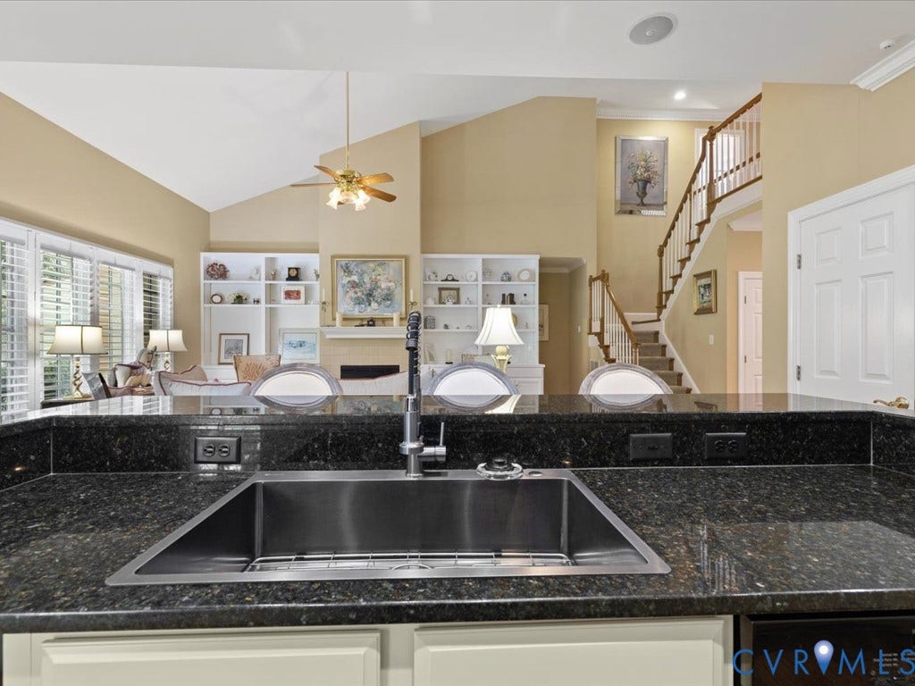 12126 Club Commons Drive, Club Commons, Glen Allen, VA 23059 Kitchen featuring a stainless steel undermount sink, dark speckled countertops, and white cabinetry