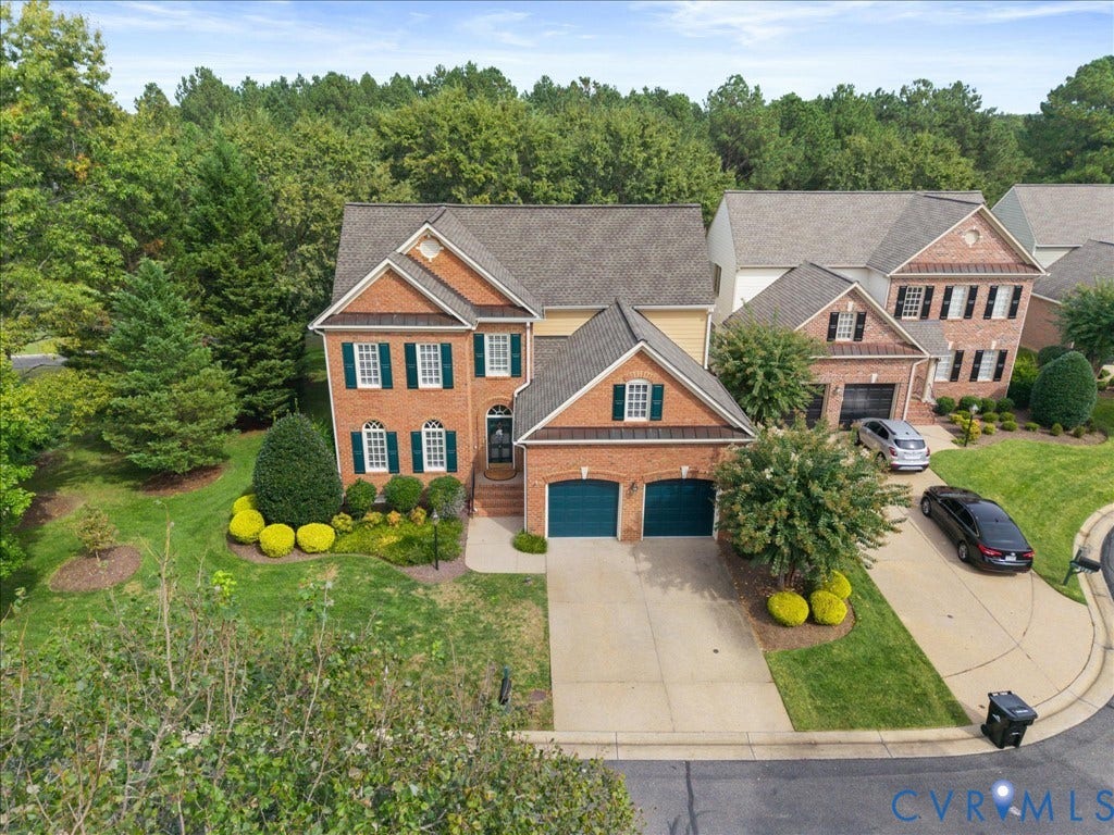12126 Club Commons Drive, Club Commons, Glen Allen, VA 23059 Brick exterior with a gabled roof and a two-car garage