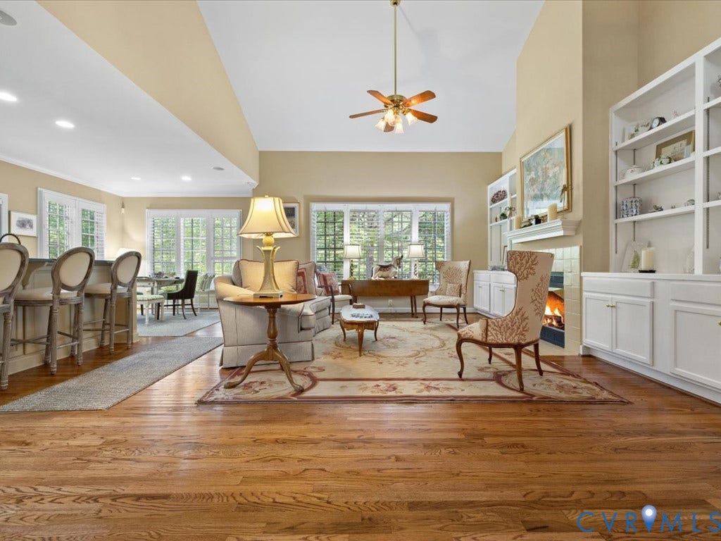 12126 Club Commons Drive, Club Commons, Glen Allen, VA 23059 Hardwood flooring throughout, vaulted ceiling, built-in shelving, fireplace, and extensive windows