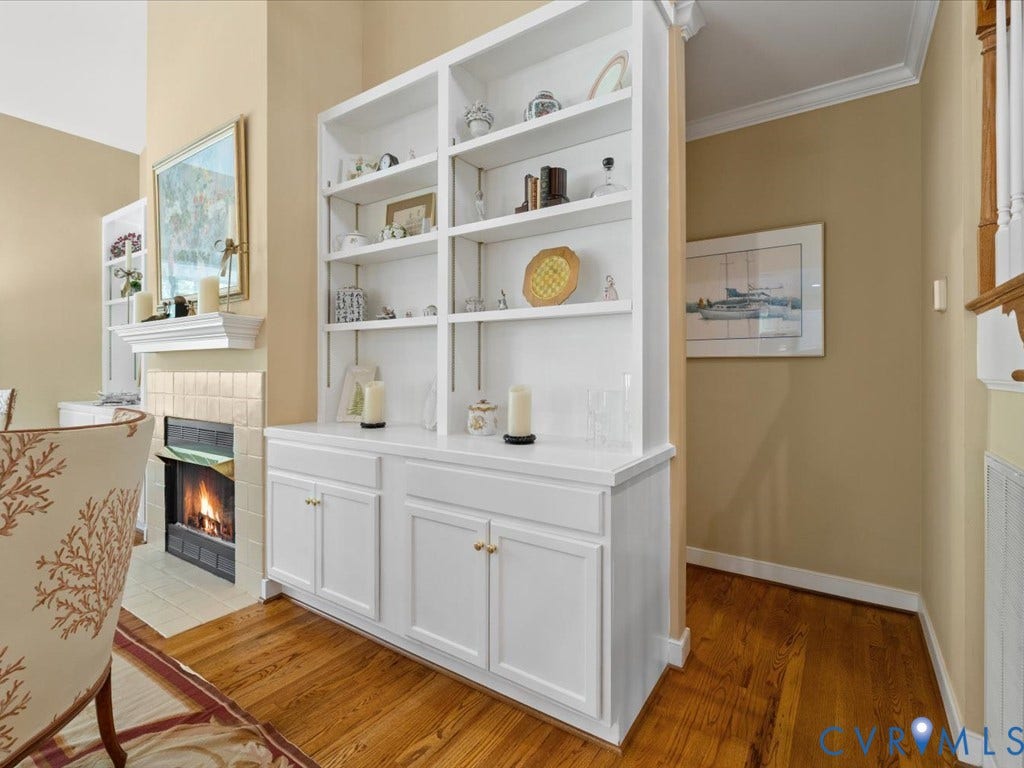 12126 Club Commons Drive, Club Commons, Glen Allen, VA 23059 Built-in shelving unit with lower cabinetry, wood-finish flooring, and crown molding