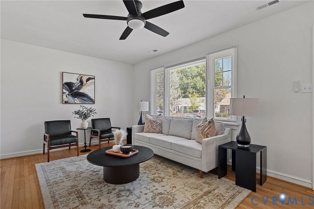 5304 Gillespie Avenue, Henrico, VA 23228 Hardwood flooring, white walls, large window with blinds, and a ceiling fan