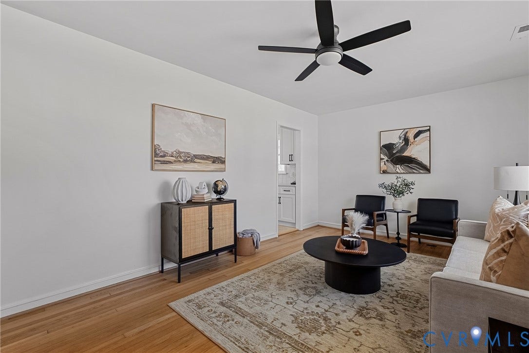 5304 Gillespie Avenue, Henrico, VA 23228 Hardwood flooring, white painted walls, and a contemporary ceiling fan
