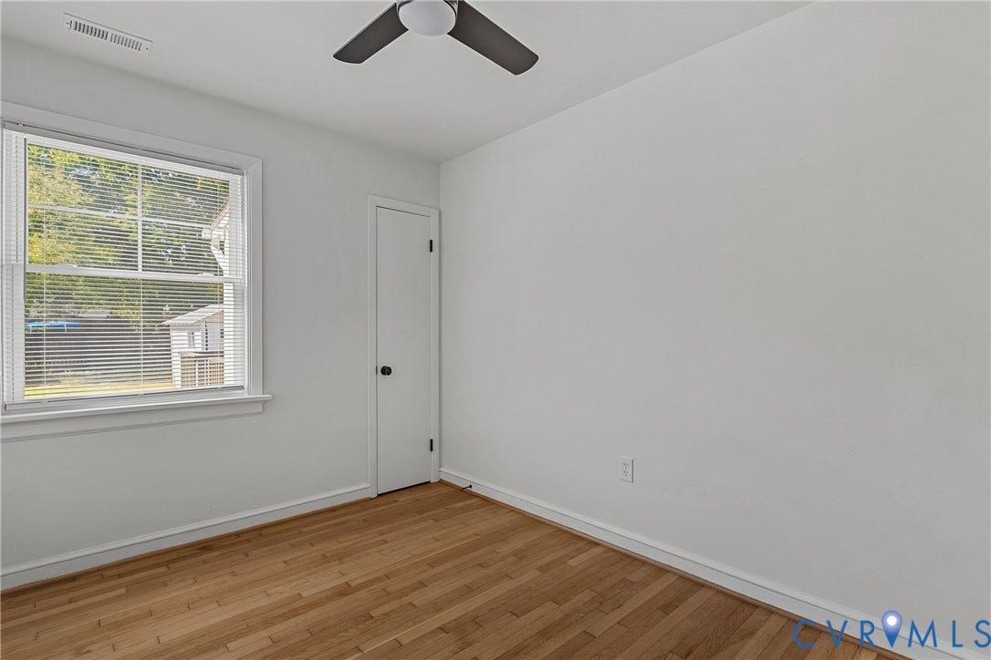 5304 Gillespie Avenue, Henrico, VA 23228 Wood-finish flooring, ceiling fan, white window blinds, and white interior door