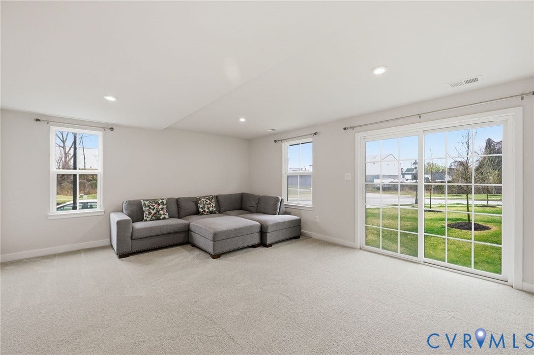 Tons of light and sliding doors to backyard.