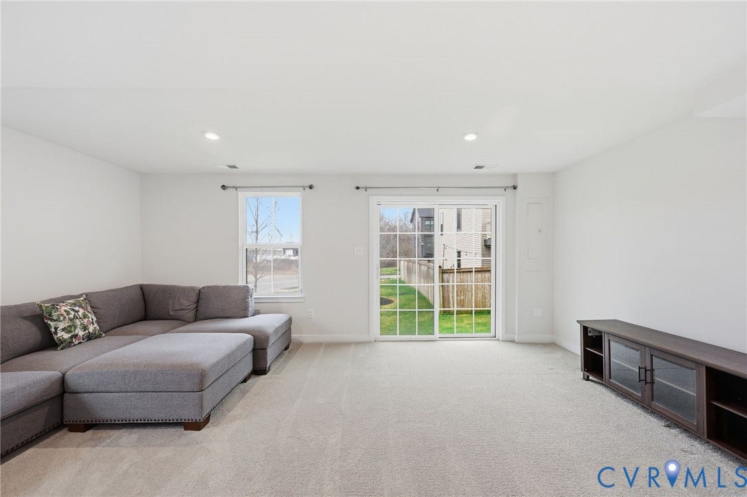 Family Room downstairs with recessed lighting.