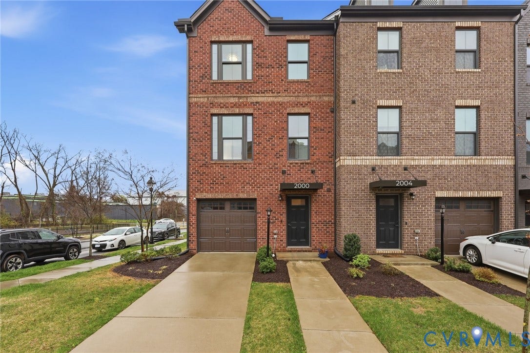 Welcome to 2000 Tobacco Mill! This 3 bedroom, 2 full and 2 half bath end unit was built in 2021.