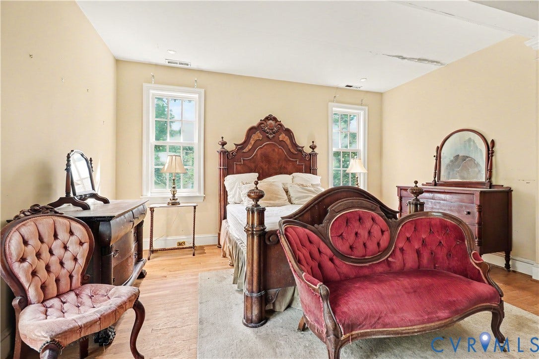 Hardwood-style flooring and two double-hung windows