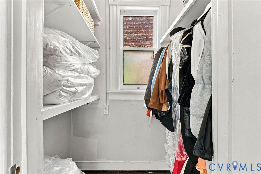 107 N Allen Avenue, The Fan, Richmond, VA 23220 Storage space featuring white built-in shelving and a central window with white millwork trim