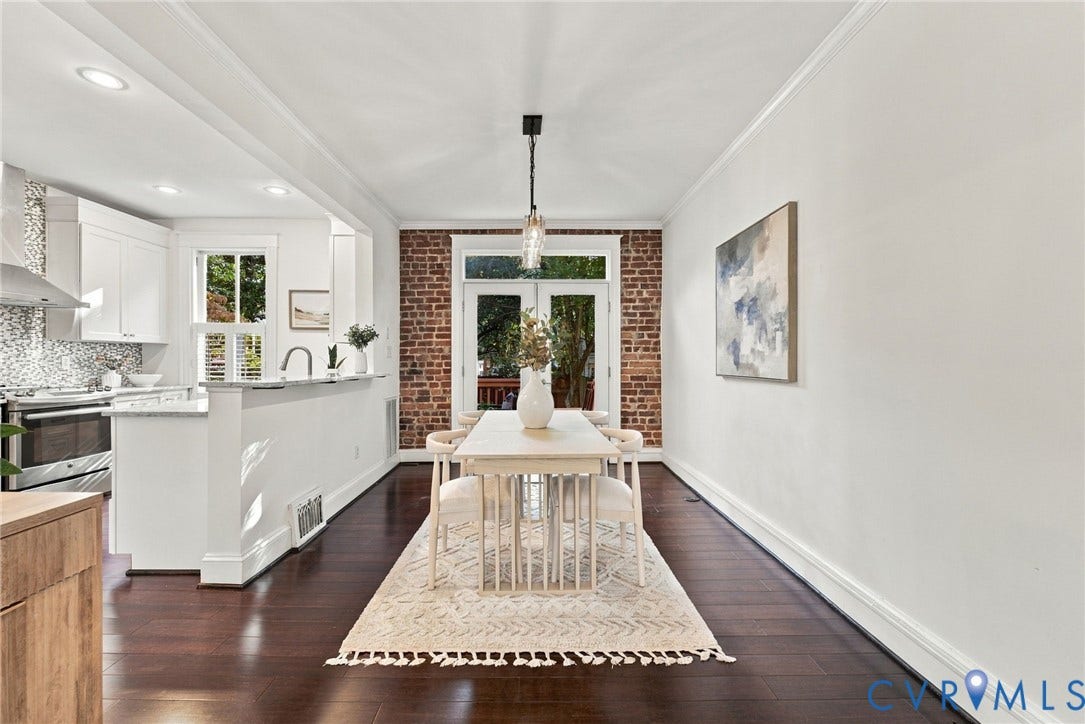 107 N Allen Avenue, The Fan, Richmond, VA 23220 Open-concept interior featuring exposed brick walls, dark wood-finish flooring, recessed lighting, and glass-paned French doors