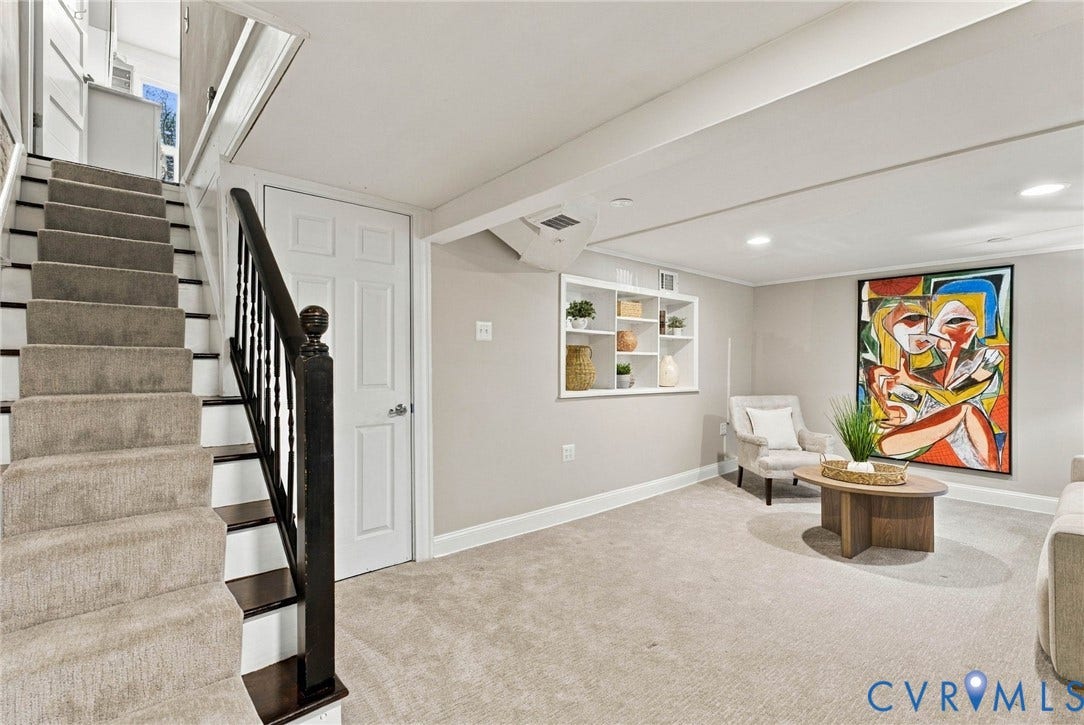 107 N Allen Avenue, The Fan, Richmond, VA 23220 Carpeted staircase with dark-finished wood balusters and handrail, recessed ceiling lighting, and built-in wall shelving