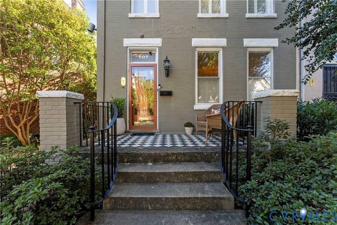 107 N Allen Avenue, The Fan, Richmond, VA 23220 Brick exterior featuring a checkered tile porch, stone-capped brick columns, wrought-iron railings, and a multi-lite front door