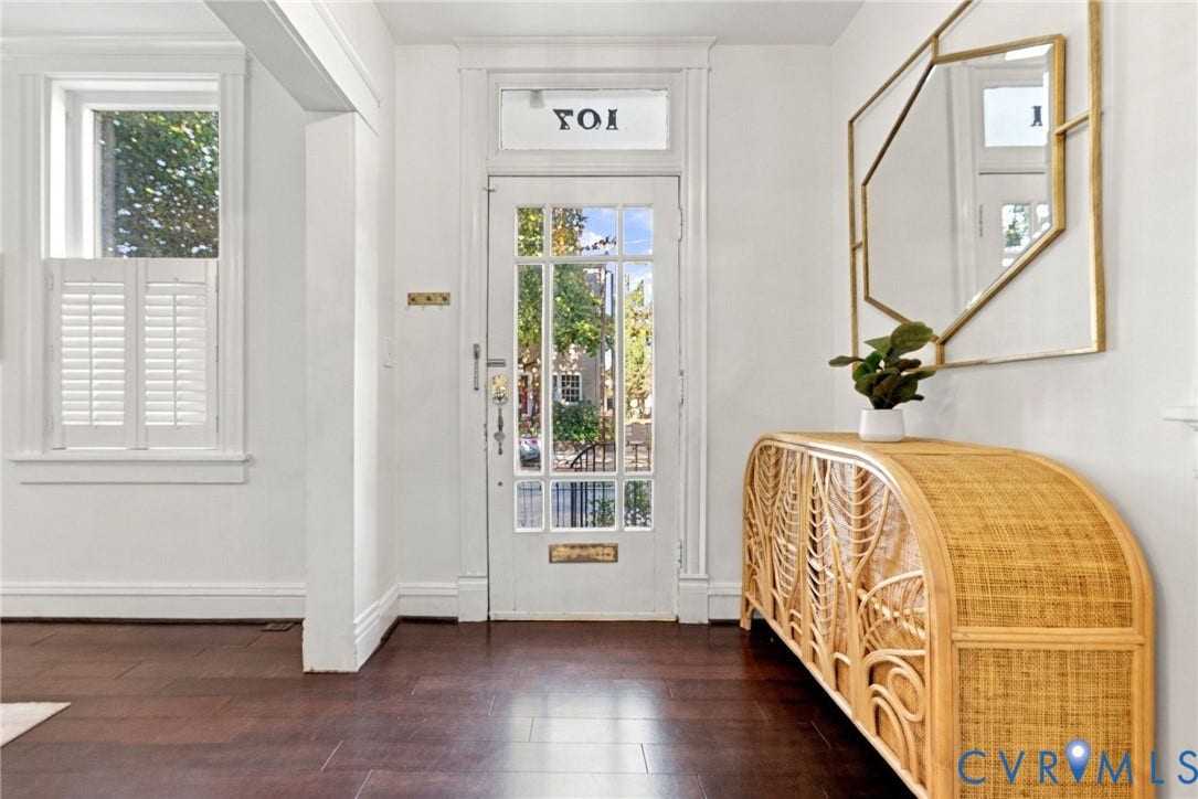 107 N Allen Avenue, The Fan, Richmond, VA 23220 Entryway featuring wood-finish flooring, a glass-panel entry door with a transom window, and window shutters