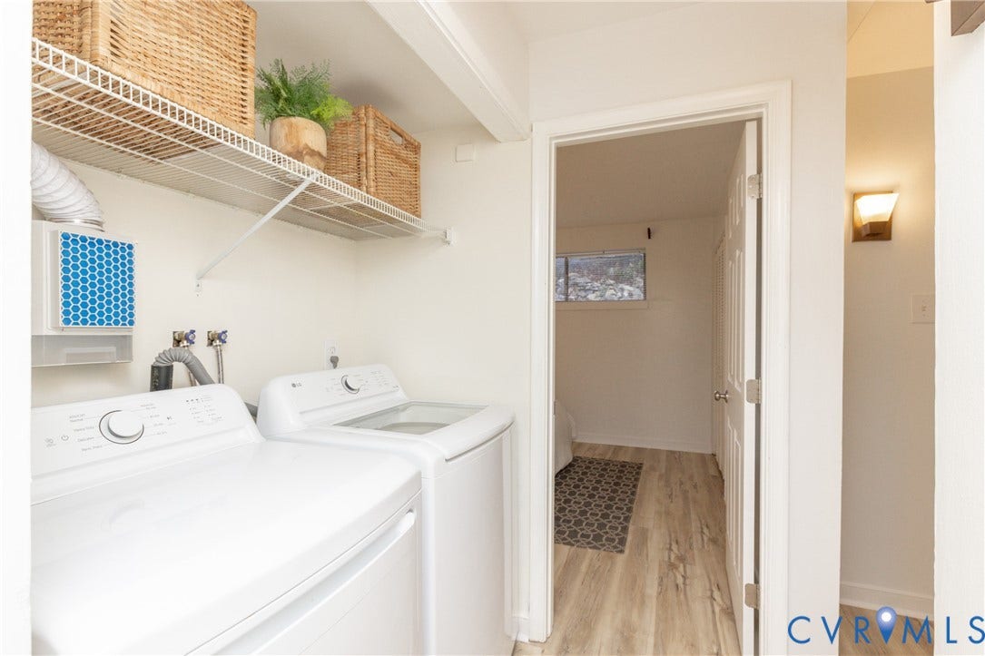 10404 Iron Mill Road, Chesterfield, VA 23235 White wire shelving, wood-finish flooring, and a wall-mounted light fixture