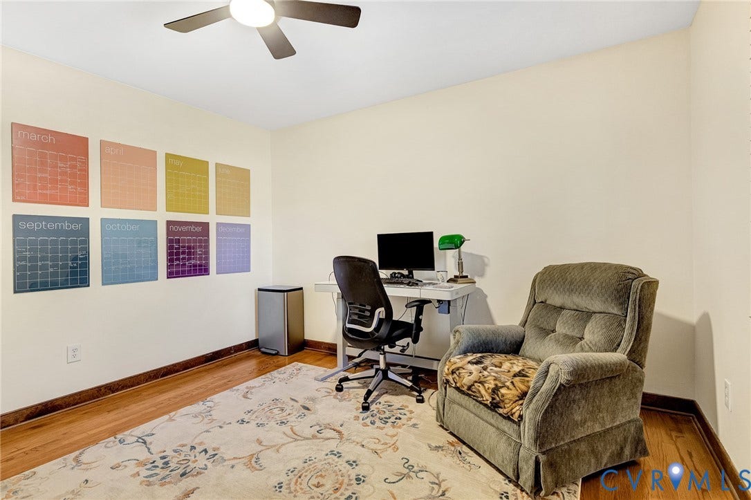 11410 Driscoll Road, Chester, VA 23831 Wood-finish flooring and a central ceiling fan with an integrated light fixture