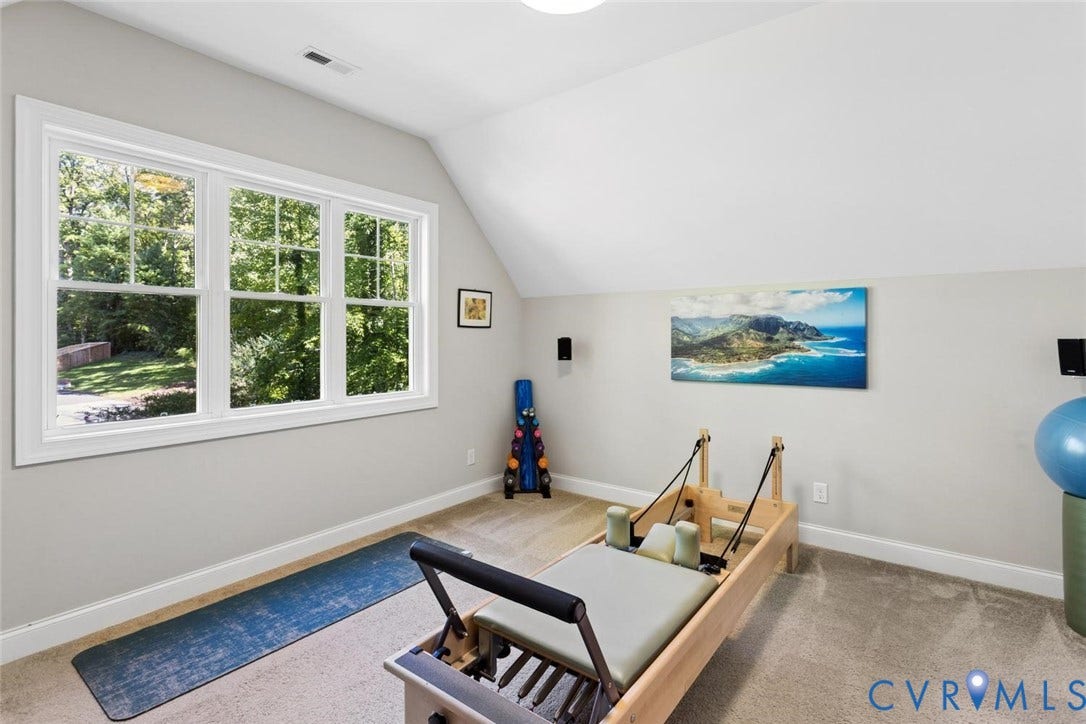 9013 Old Holly Road, Southhampton, Richmond, VA 23235 Vaulted ceiling with recessed lighting, large multi-pane window, light gray wall finish, and neutral-toned carpet flooring