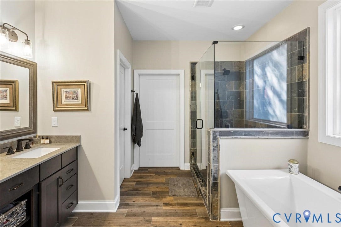 9013 Old Holly Road, Southhampton, Richmond, VA 23235 Walk-in shower with natural stone tile and glass enclosure