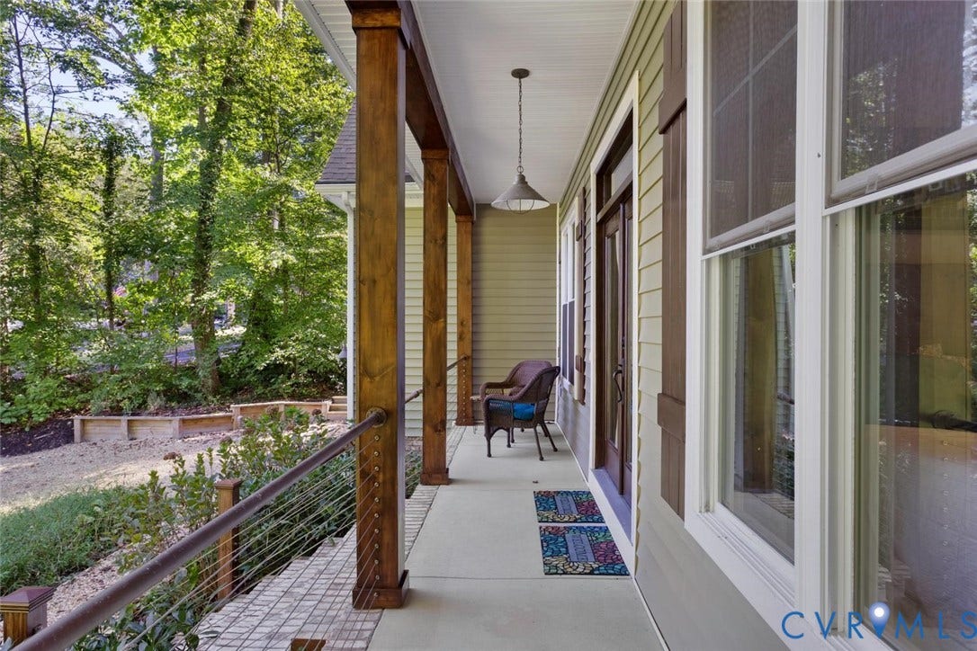 9013 Old Holly Road, Southhampton, Richmond, VA 23235 Covered front porch featuring wood-finish columns, cable railing, and a hanging pendant light