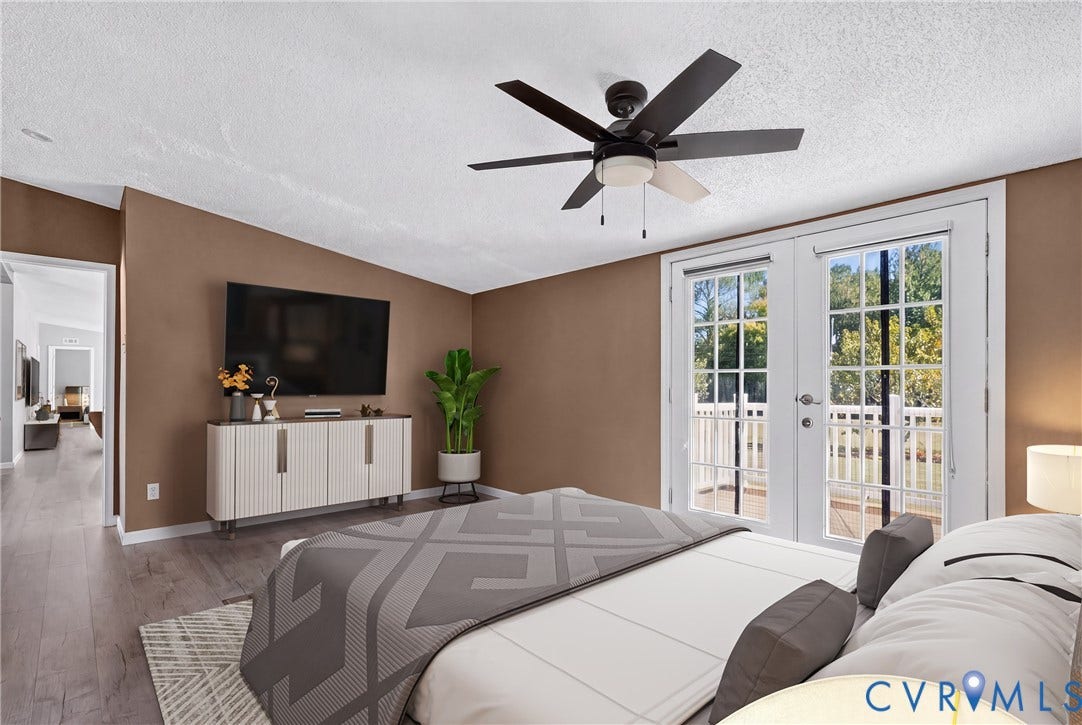 8211 Brills Road, Dinwiddie, VA 23872 Vaulted ceiling with a ceiling fan, French doors with grid glass, and wood-finish flooring