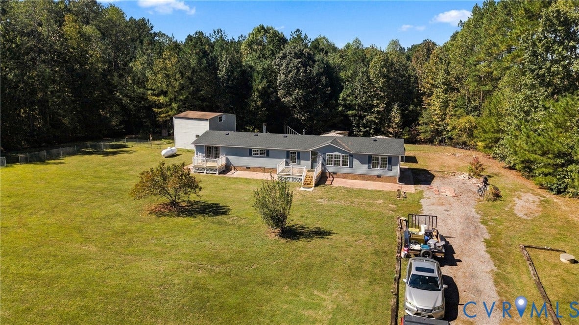 8211 Brills Road, Dinwiddie, VA 23872 Single-story residence with light blue siding