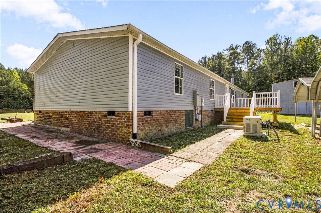 8211 Brills Road, Dinwiddie, VA 23872 Exterior siding with brick foundation