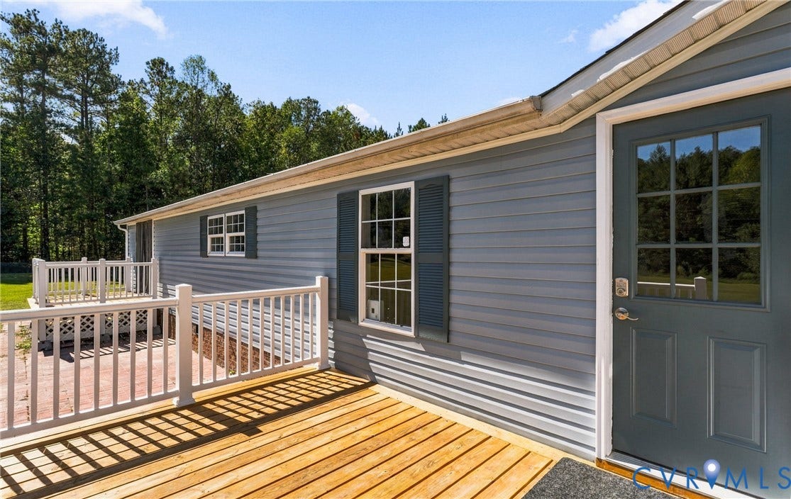 8211 Brills Road, Dinwiddie, VA 23872 Wood-finish decking with white railing