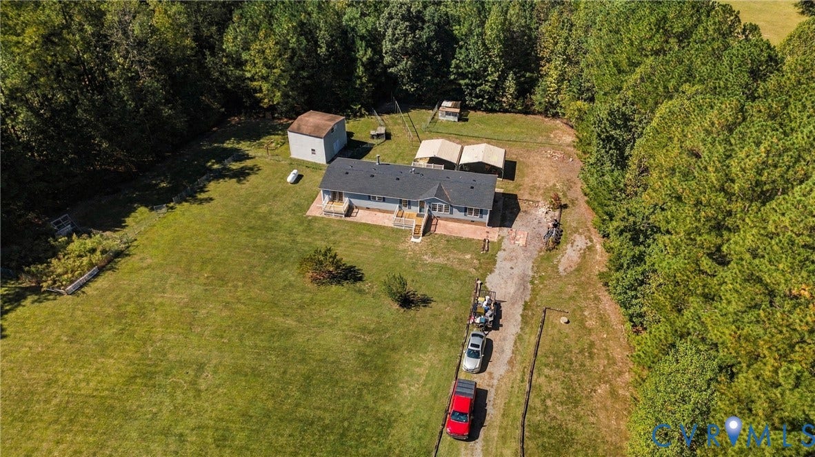 8211 Brills Road, Dinwiddie, VA 23872 Expansive lot with lush green landscaping