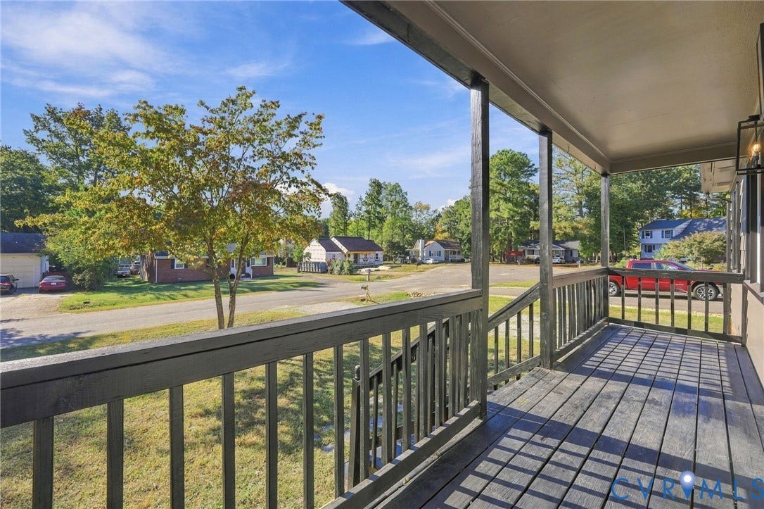 5113 Olympic Lane, North Dinwiddie, VA 23803 Covered front porch with wood-finish decking and railing