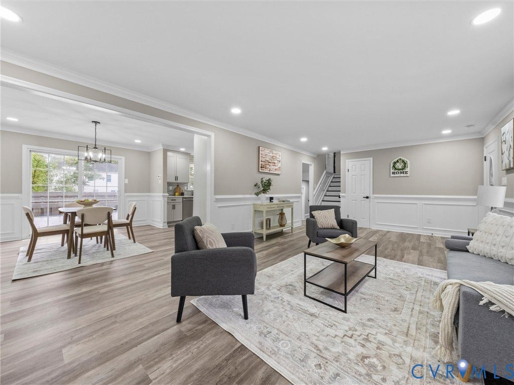 2031 Esquire Road, Midlothian, VA 23235 Recessed ceiling lighting, wood-finish flooring, wainscoting, crown molding, and a built-in kitchen