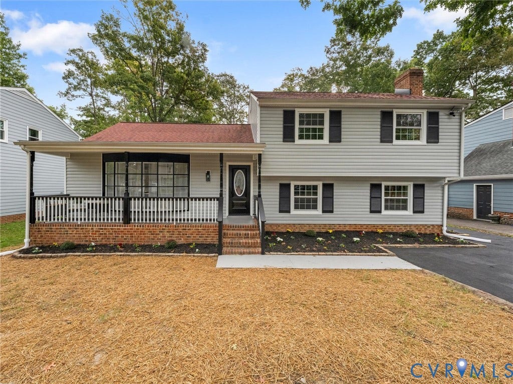 2031 Esquire Road, Midlothian, VA 23235 Split-level residence featuring light-colored siding, a covered front porch with a white railing, and a brick foundation