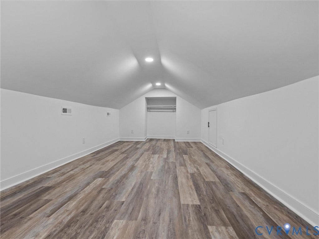 2031 Esquire Road, Midlothian, VA 23235 Vaulted ceiling with recessed lighting, wood-finish flooring, built-in closet, and white baseboards
