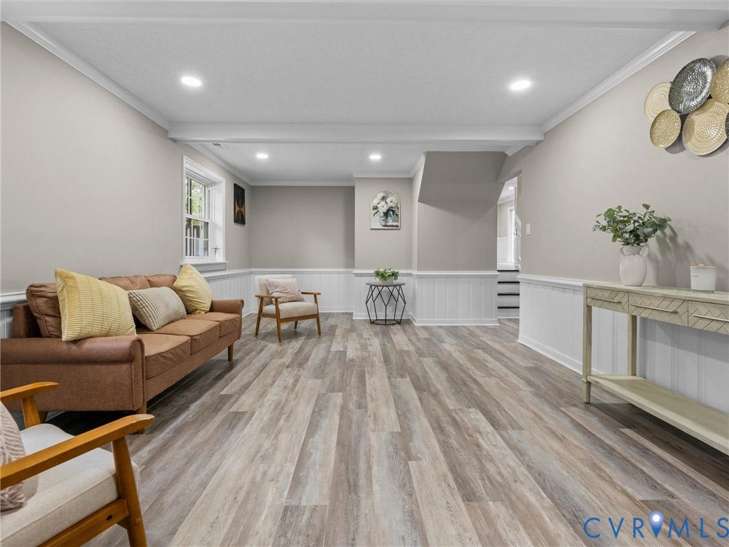 2031 Esquire Road, Midlothian, VA 23235 Spacious room featuring wood-finish flooring, recessed lighting, and white wainscoting