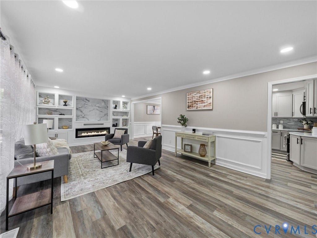 2031 Esquire Road, Midlothian, VA 23235 Wood-finish flooring, built-in shelving, linear fireplace, recessed lighting, and crown molding