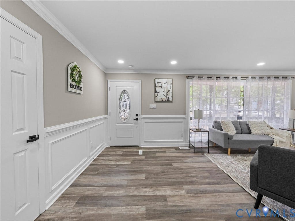 2031 Esquire Road, Midlothian, VA 23235 Wood-finish flooring with recessed lighting, crown molding, and wainscoting