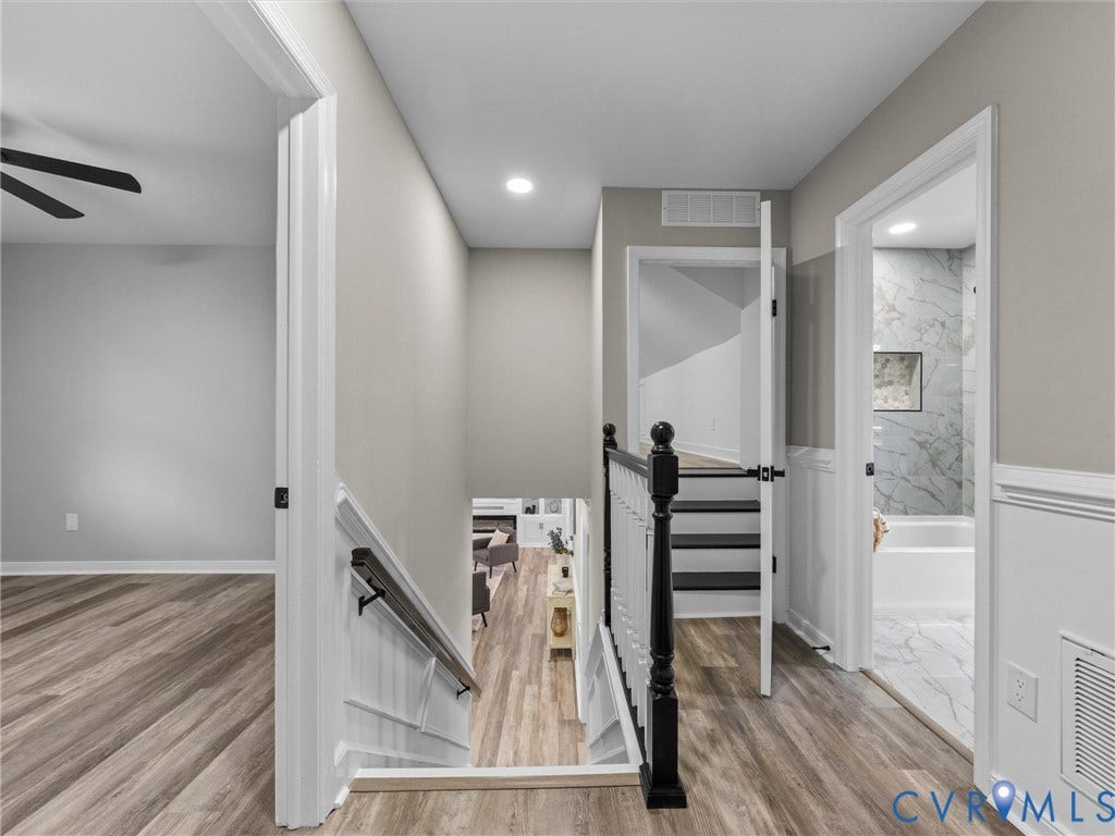2031 Esquire Road, Midlothian, VA 23235 Wood-finish flooring throughout the hallway and room