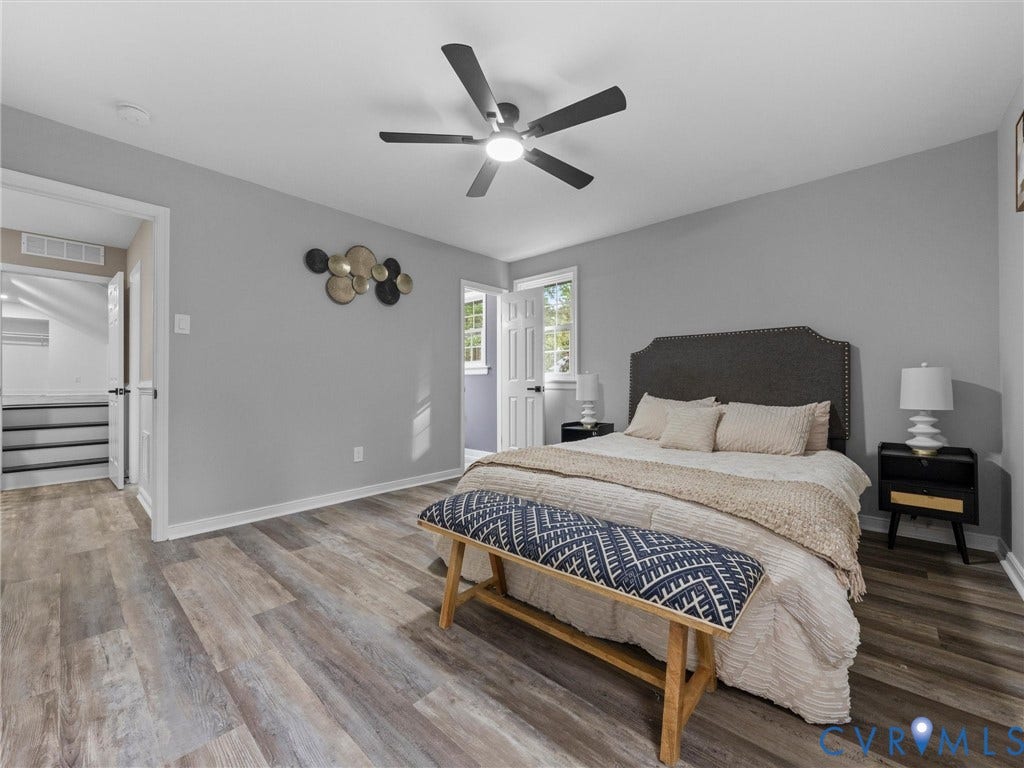 2031 Esquire Road, Midlothian, VA 23235 Wood-finish flooring throughout, ceiling fan with integrated lighting, and light gray wall finishes
