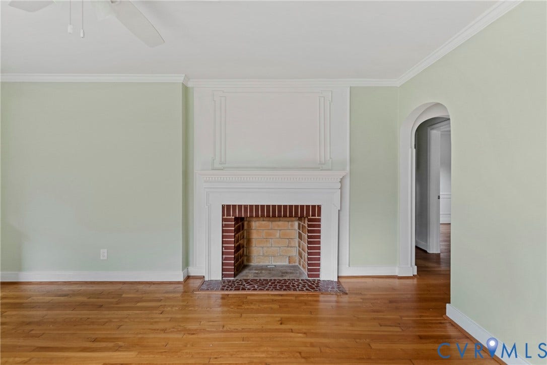 Decorative fireplace with a brick surround