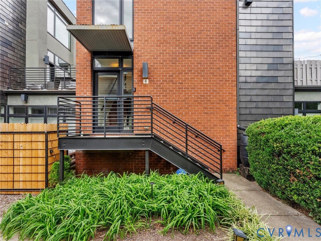 Brick exterior with corrugated metal awning