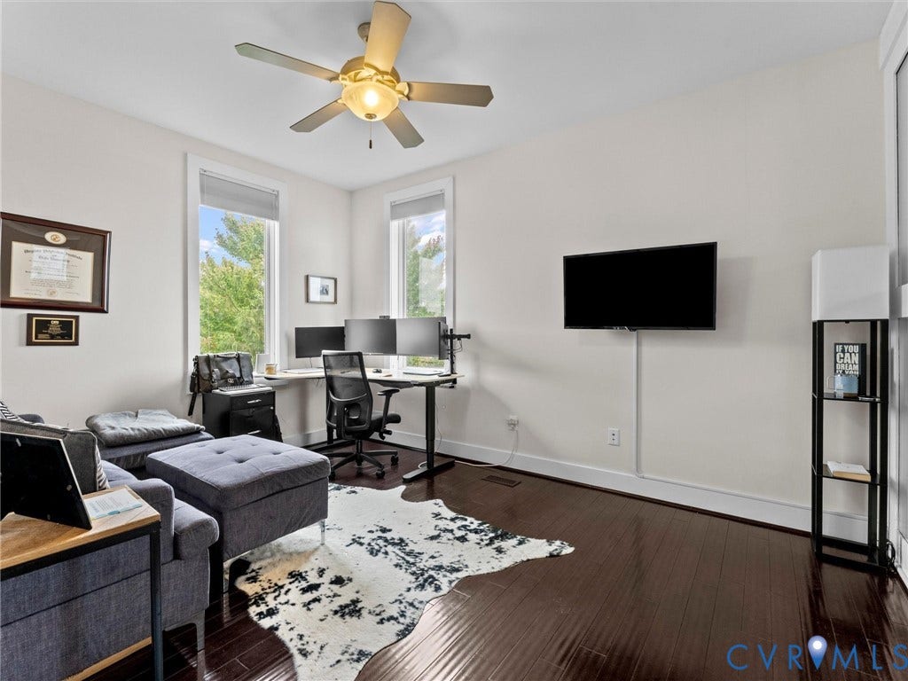 Wood-finish flooring, recessed lighting, and a ceiling fan with integrated light fixture