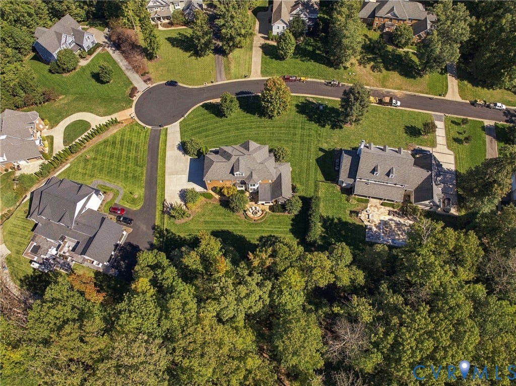 Property situated on a cul-de-sac with mature trees and extensive green space