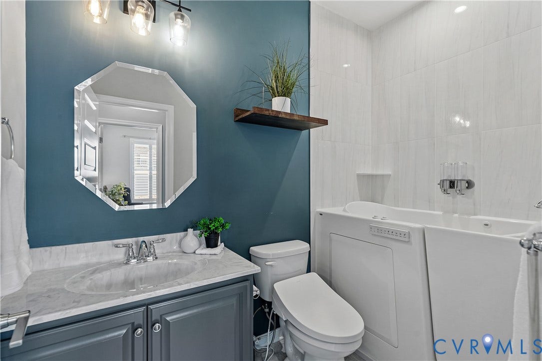 Guest first level full bathroom - handicap accessible shower/bath.