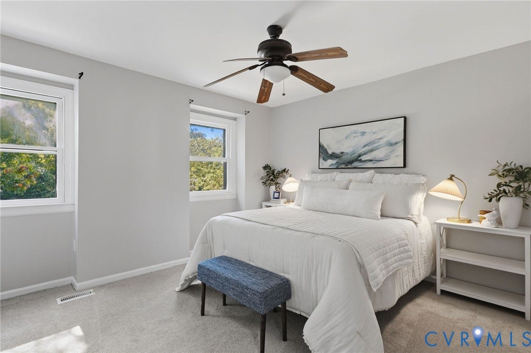 55 Dehaven Drive, Henrico, VA 23238 Light gray wall color, multiple windows, ceiling fan with integrated lighting, and neutral-toned carpeting